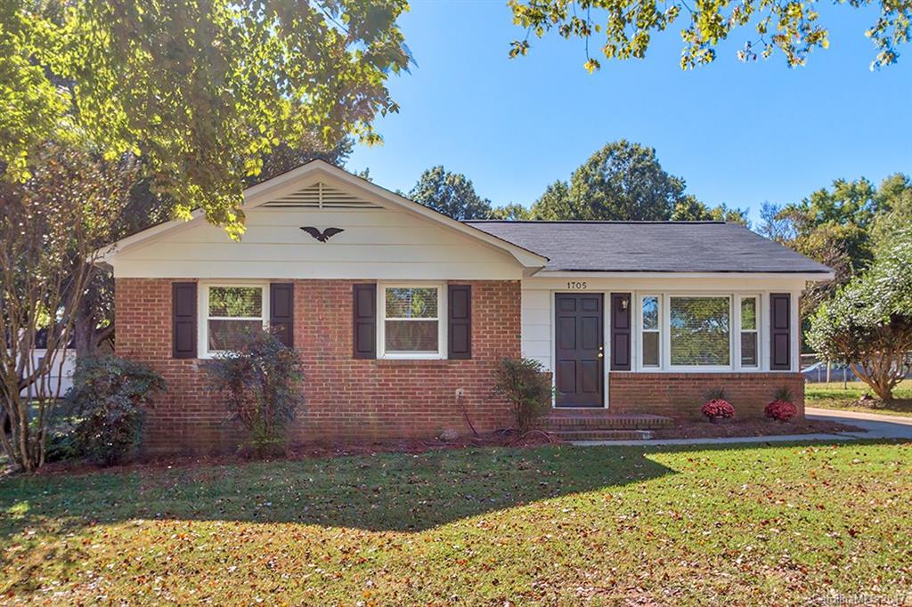 1705 Rushing Street, Unit 38 Monroe, NC 28112 - Photo 20 of 21 a front view of a house with garden