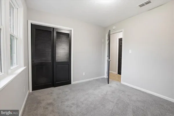 an empty room with closet