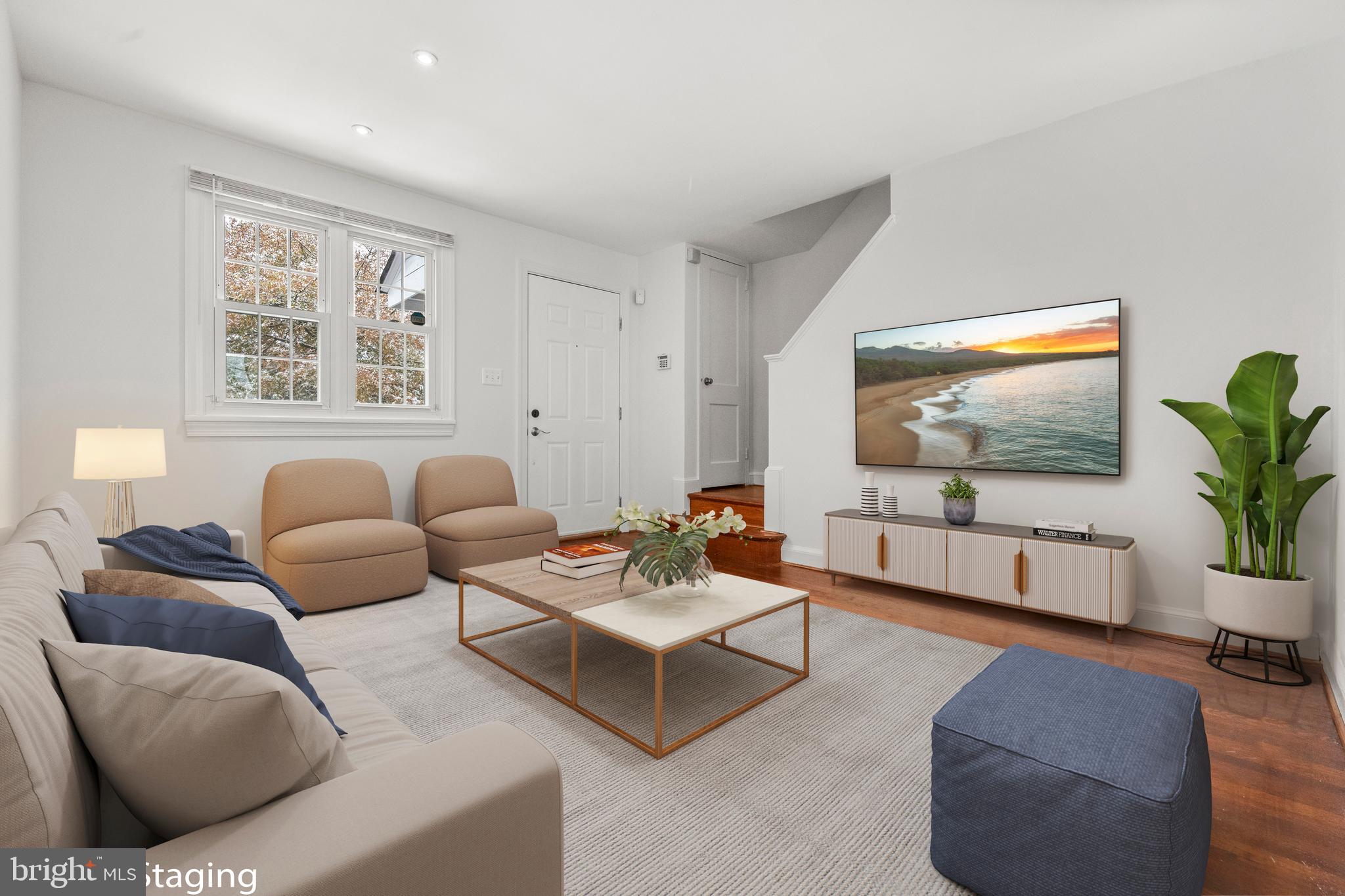 4244 Hildreth Street Southeast Washington, DC 20019 - Photo 2 of 31 a living room with furniture and a flat screen tv