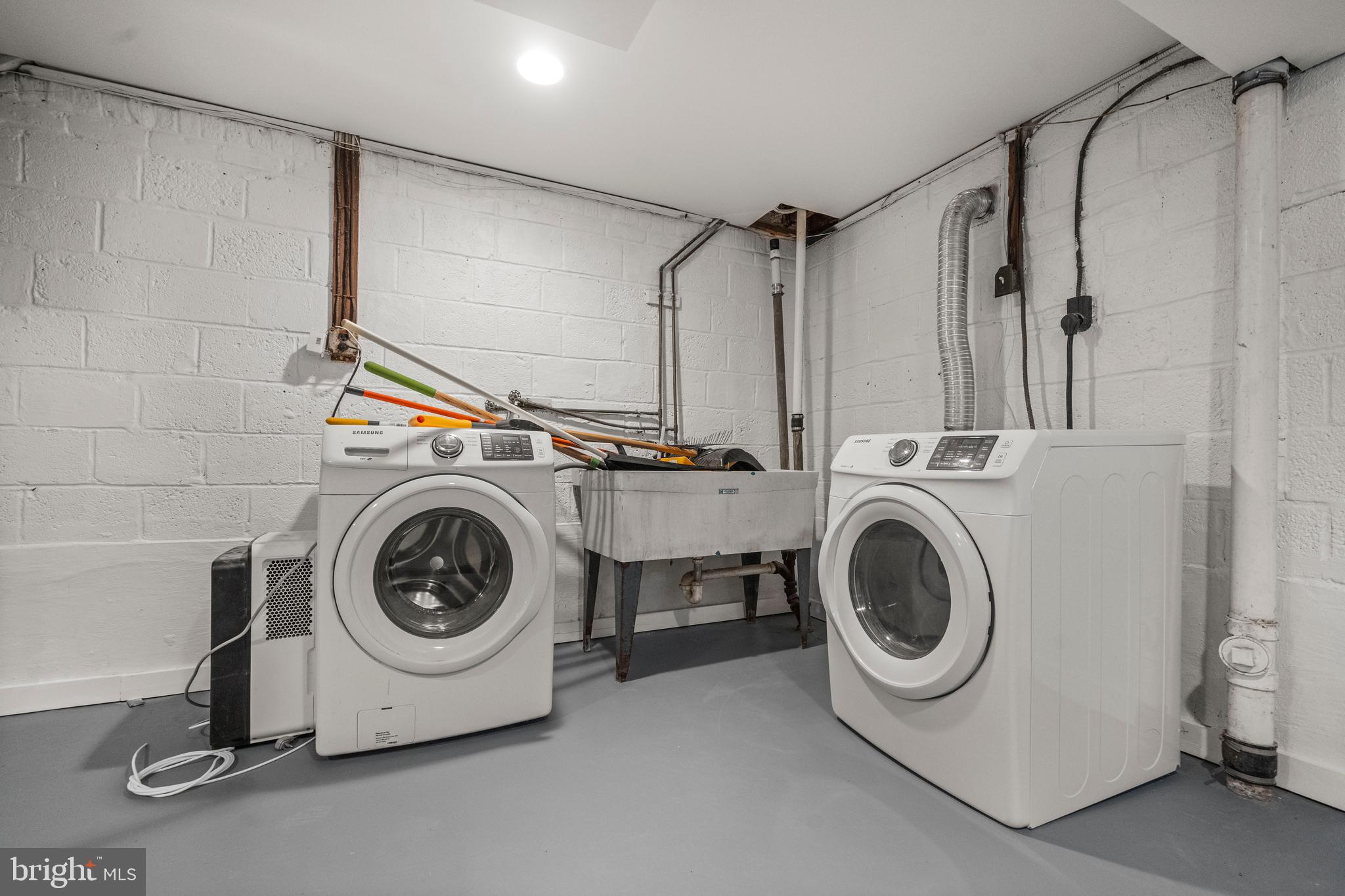 4244 Hildreth Street Southeast Washington, DC 20019 - Photo 24 of 31 a utility room with dryer and washer