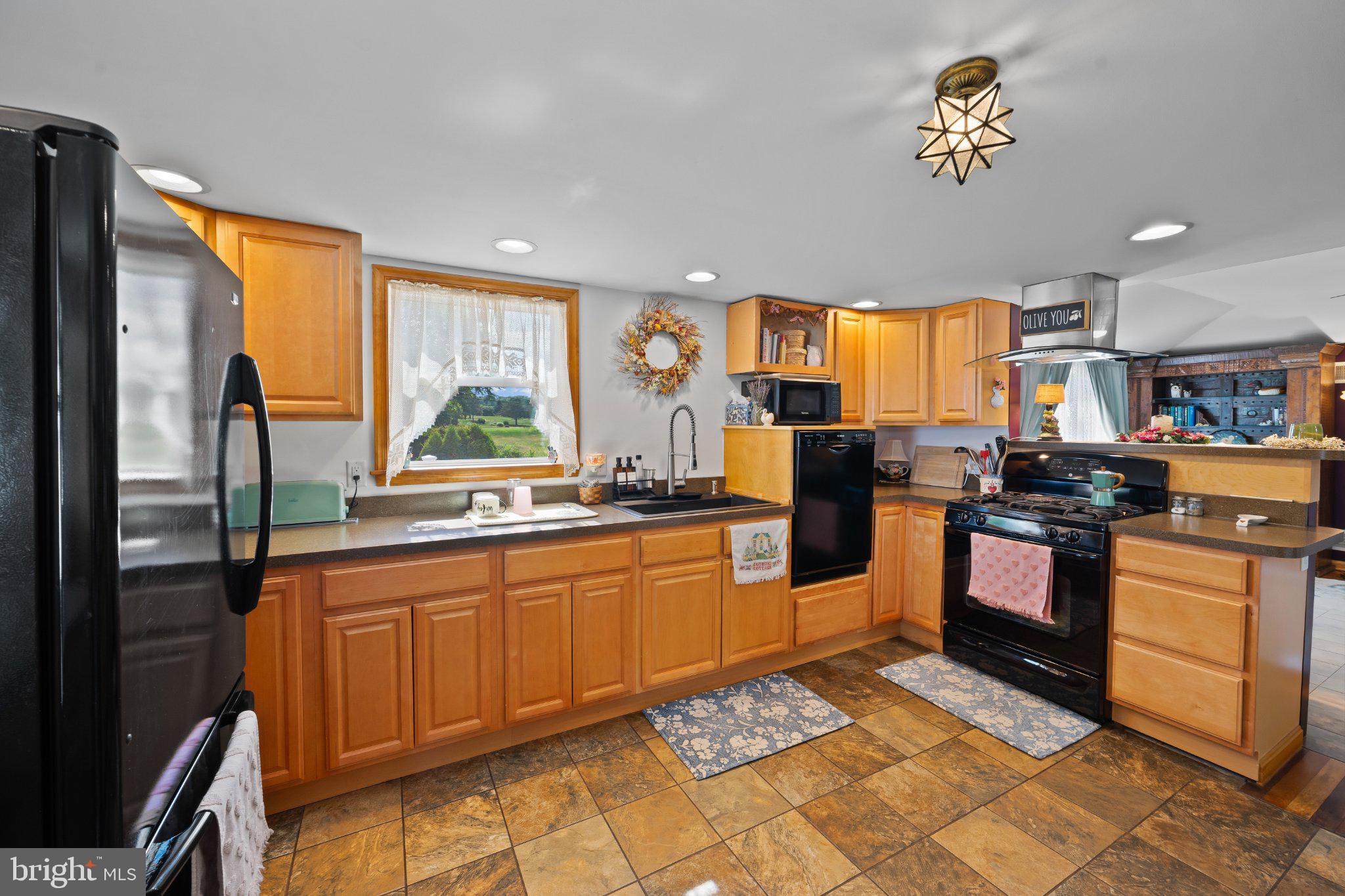 753 Gilbert Road Aberdeen, MD 21001 - Photo 6 of 10 Charming kitchen with warm wood tones.