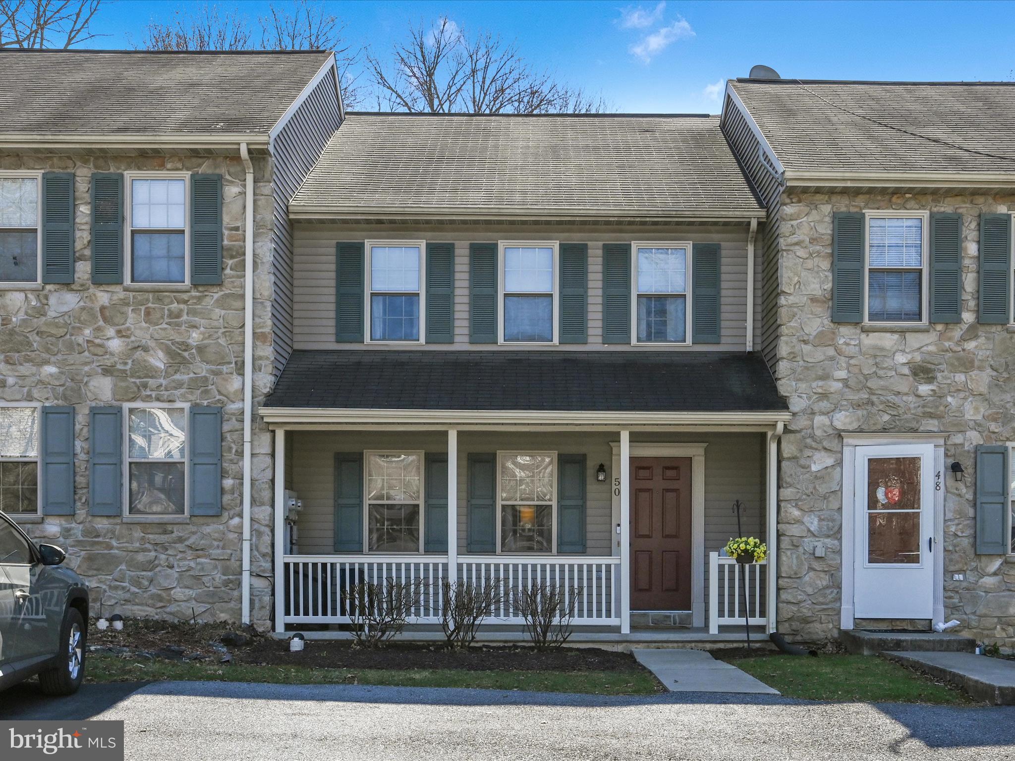50 Deep Hollow Lane Lancaster, PA 17603 - Photo 1 of 27 a front view of a house with a yard