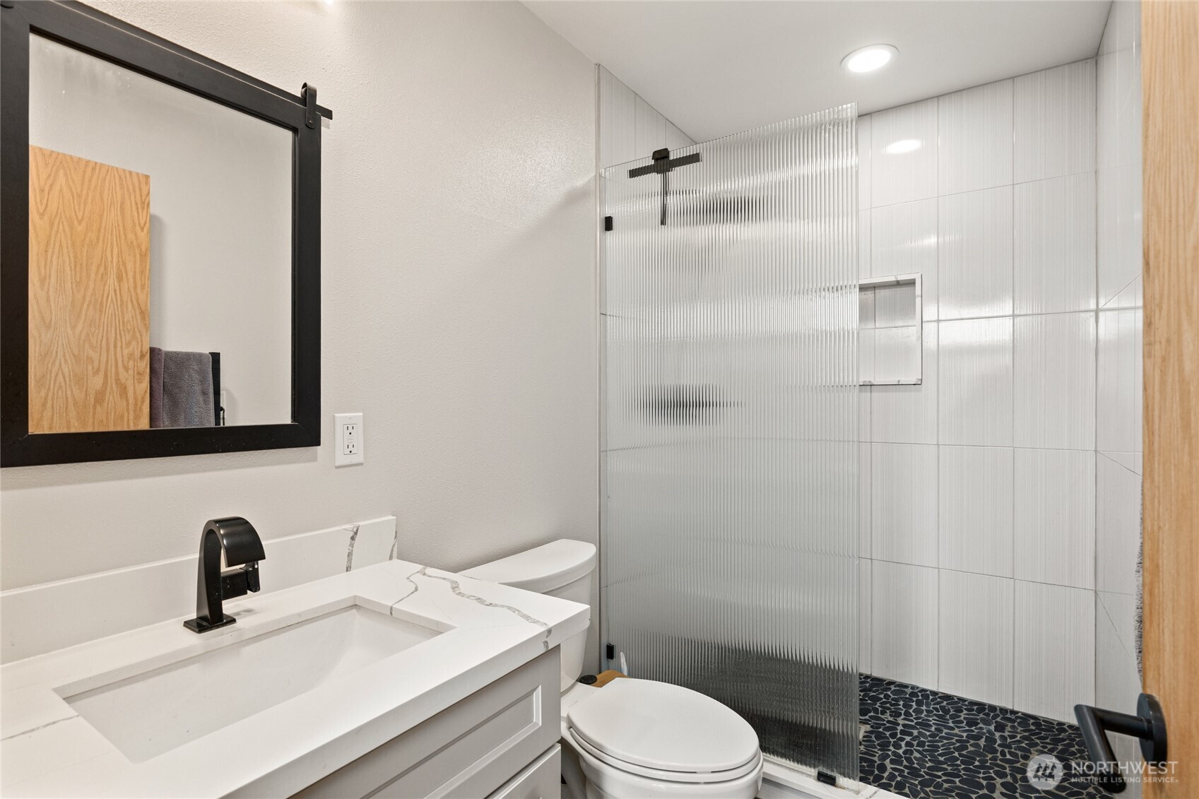 340 Powerline Road Cle Elum, WA 98922 - Photo 17 of 40 a bathroom with a sink a toilet and shower