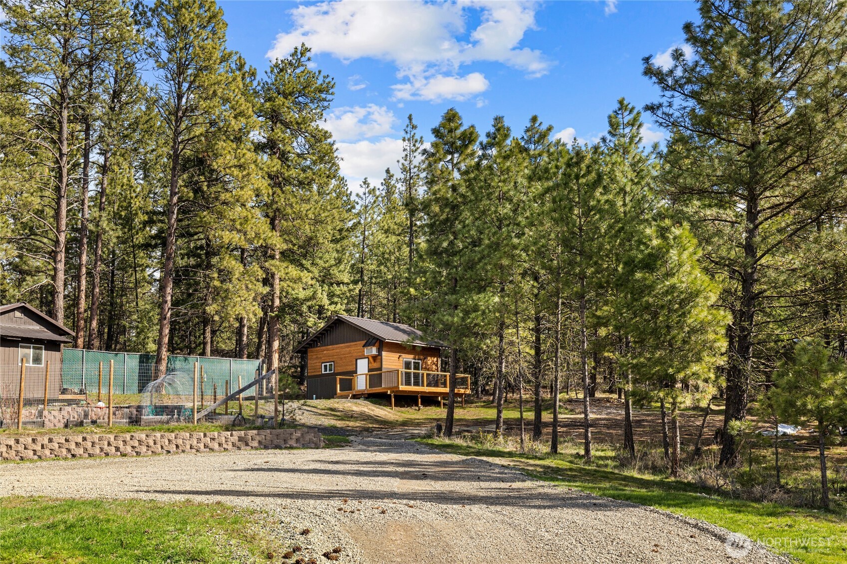 340 Powerline Road Cle Elum, WA 98922 - Photo 28 of 40 a front view of a house with a yard