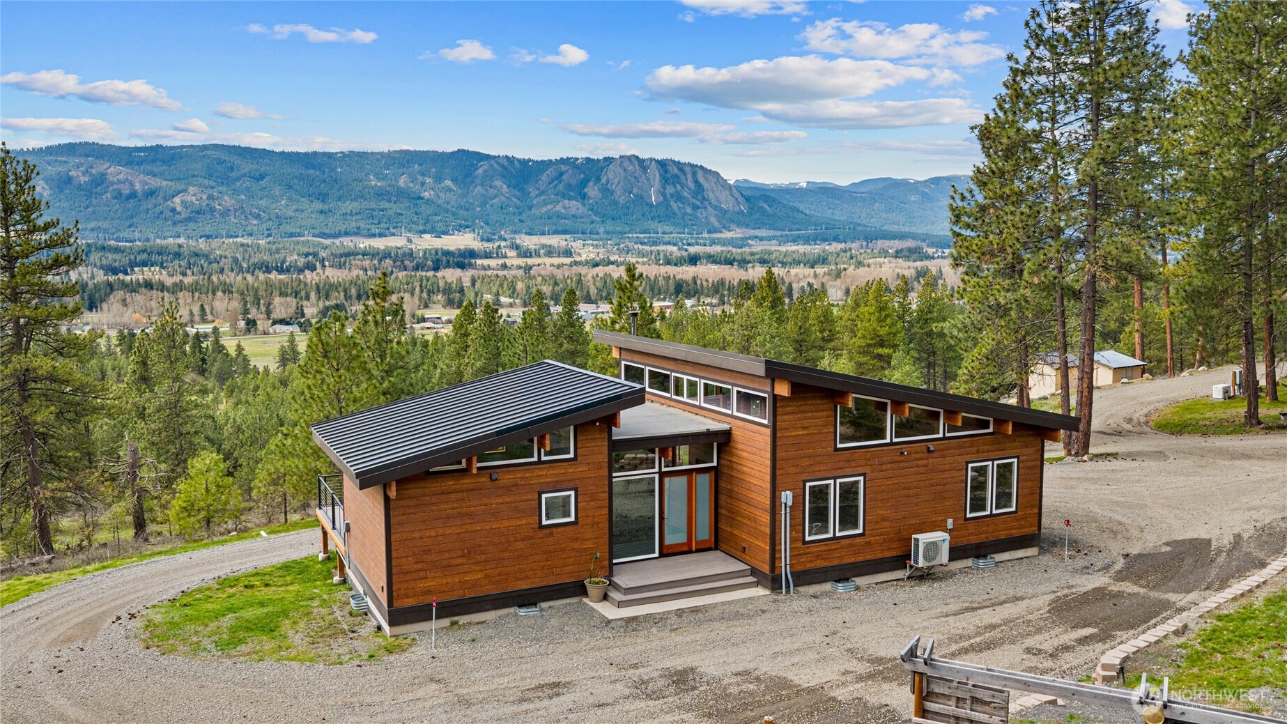 340 Powerline Road Cle Elum, WA 98922 - Photo 3 of 40 a view of a house with a outdoor space