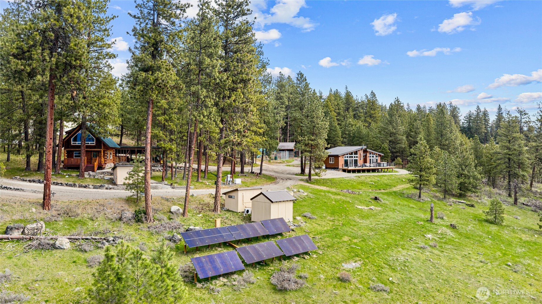340 Powerline Road Cle Elum, WA 98922 - Photo 4 of 40 a swimming pool with trees in the background