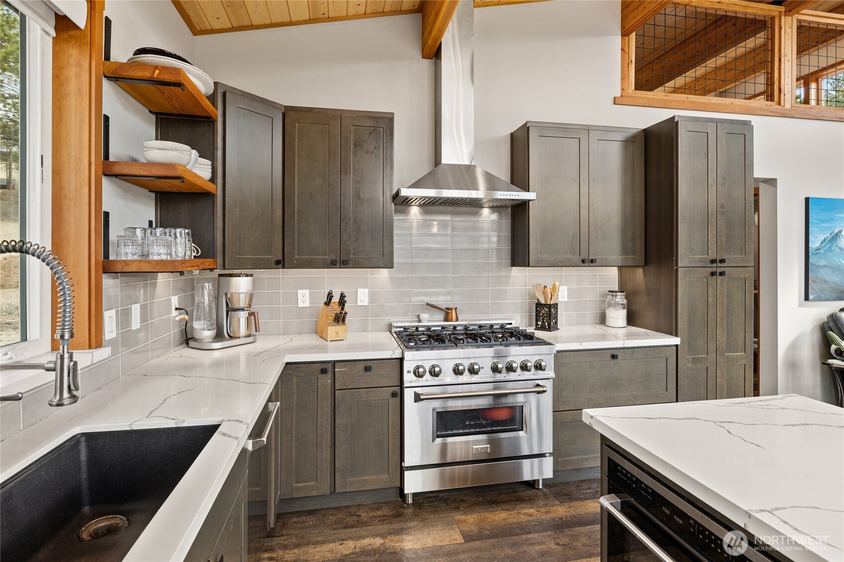 340 Powerline Road Cle Elum, WA 98922 - Photo 8 of 40 a kitchen with stainless steel appliances a stove a sink and a refrigerator