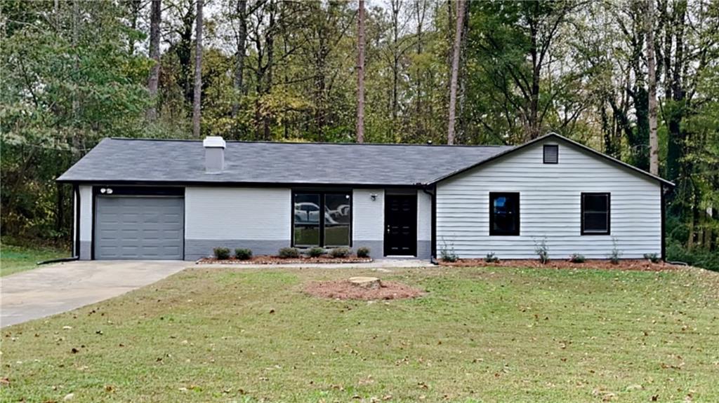 4323 Juneberry Court Decatur, GA 30034 - Photo 1 of 1 a front view of a house with a yard