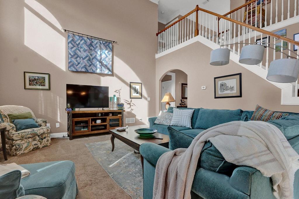 2095 Pinehurst View Drive Grayson, GA 30017 - Photo 11 of 45 a living room with furniture and a flat screen tv