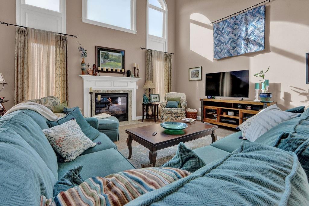 2095 Pinehurst View Drive Grayson, GA 30017 - Photo 12 of 45 a living room with furniture and a fireplace