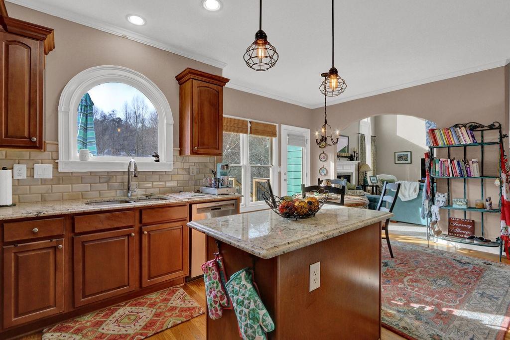 2095 Pinehurst View Drive Grayson, GA 30017 - Photo 17 of 45 a kitchen with a sink a counter space and a view of living room
