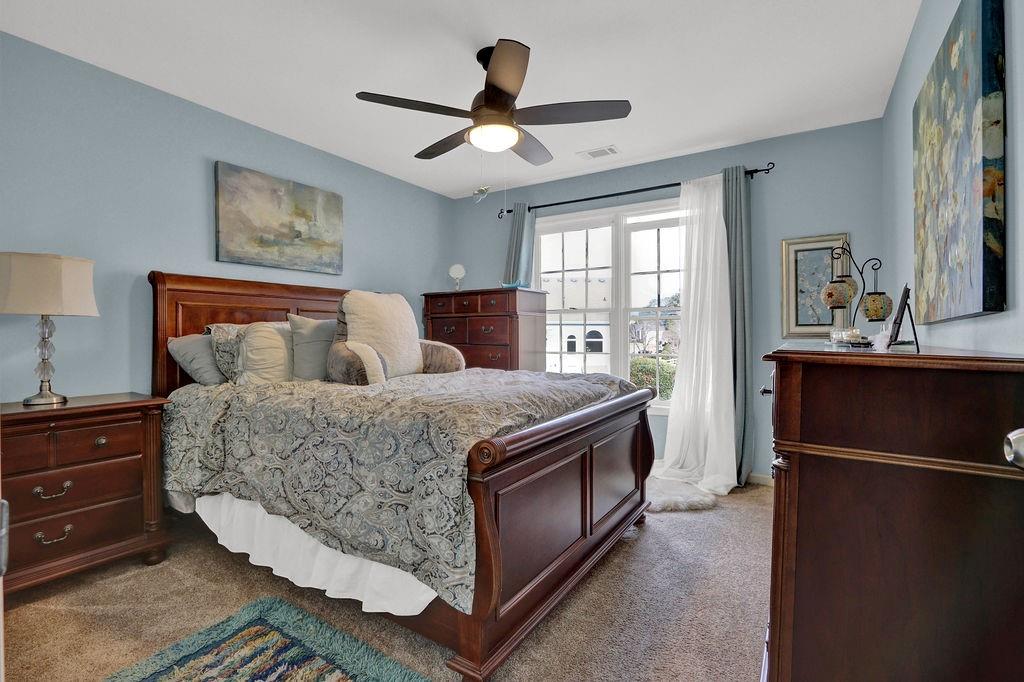 2095 Pinehurst View Drive Grayson, GA 30017 - Photo 19 of 45 a bed room with a bed and a ceiling fan