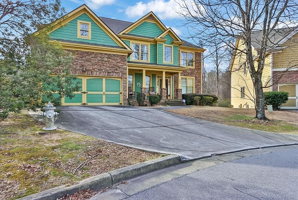 2095 Pinehurst View Drive Grayson, GA 30017 - Photo 2 of 45 a front view of a house with garden