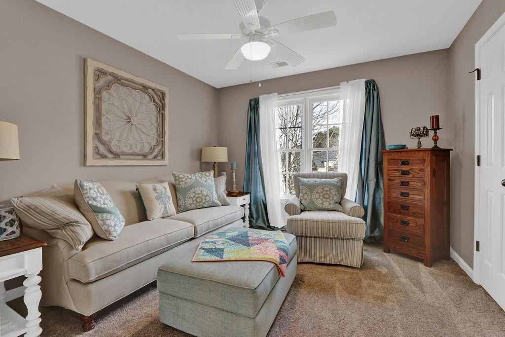 2095 Pinehurst View Drive Grayson, GA 30017 - Photo 22 of 45 a living room with furniture and a large window