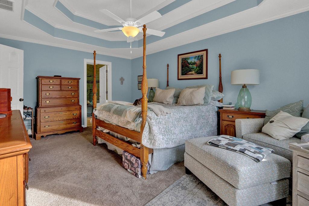 2095 Pinehurst View Drive Grayson, GA 30017 - Photo 27 of 45 a bedroom with bed and a lamp on dresser