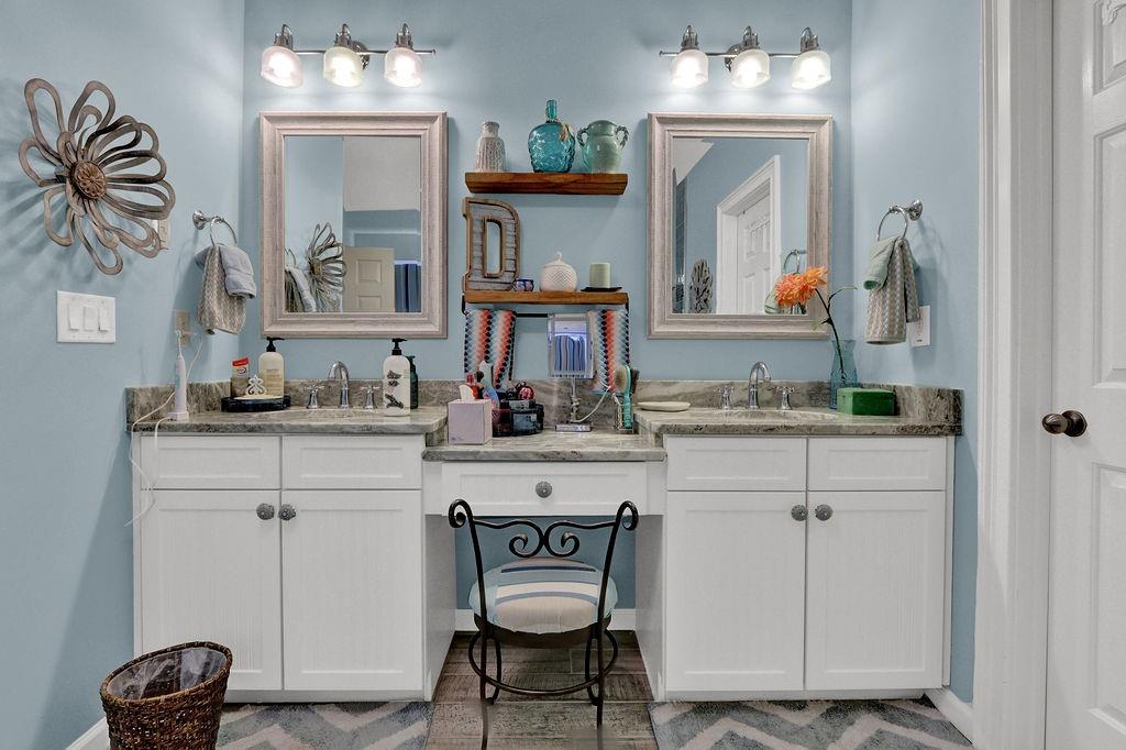 2095 Pinehurst View Drive Grayson, GA 30017 - Photo 28 of 45 a bathroom with a sink and a mirror