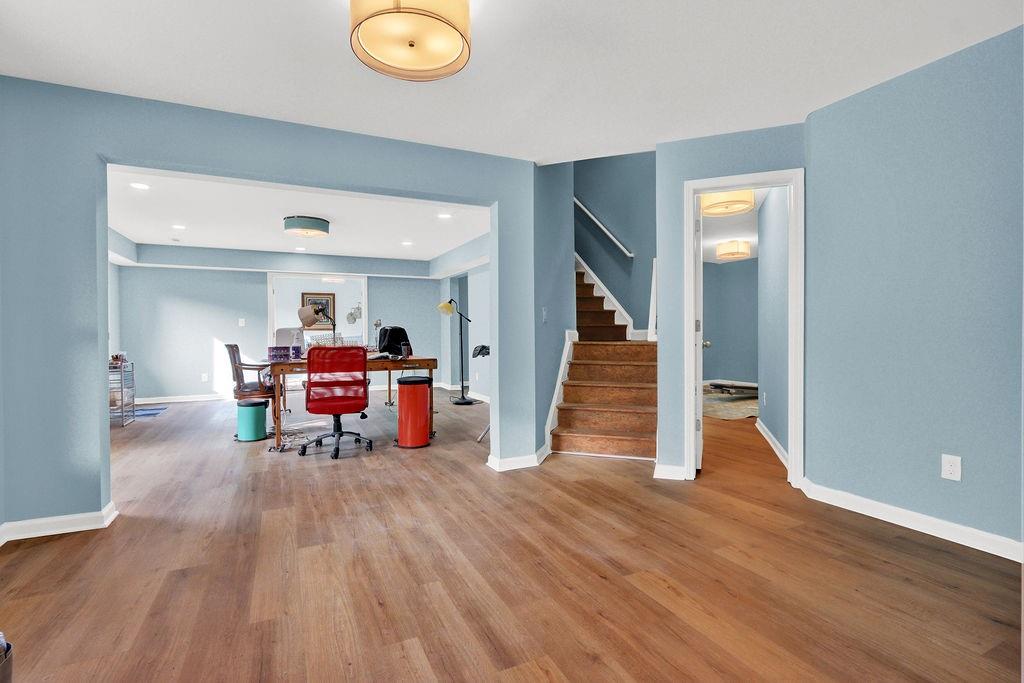 2095 Pinehurst View Drive Grayson, GA 30017 - Photo 33 of 45 a living room with furniture and a wooden floor