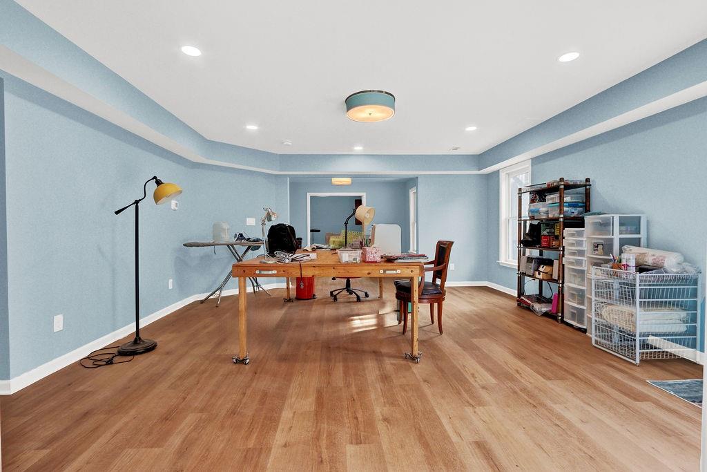 2095 Pinehurst View Drive Grayson, GA 30017 - Photo 35 of 45 a living room with furniture and a wooden floor
