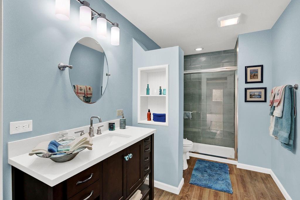 2095 Pinehurst View Drive Grayson, GA 30017 - Photo 37 of 45 a bathroom with a sink and a mirror