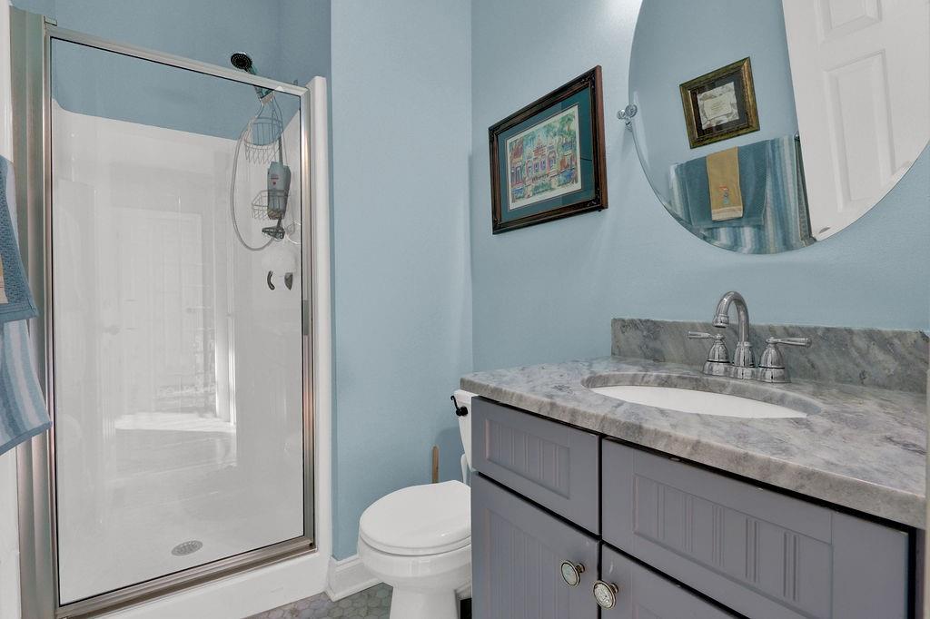 2095 Pinehurst View Drive Grayson, GA 30017 - Photo 8 of 45 a bathroom with a granite countertop sink toilet and shower