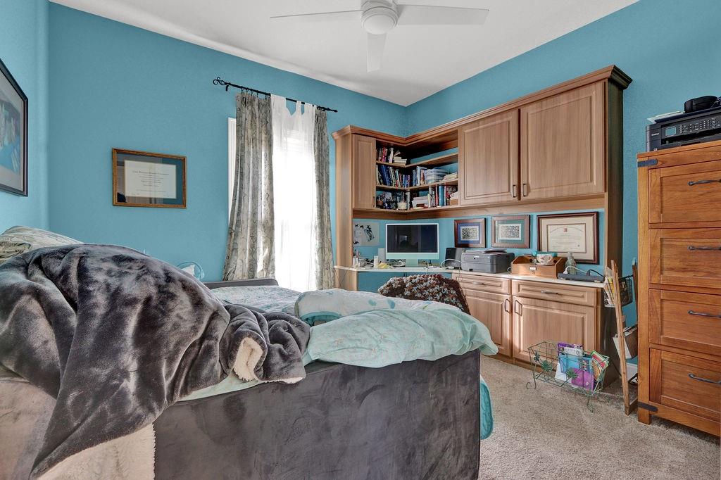 2095 Pinehurst View Drive Grayson, GA 30017 - Photo 9 of 45 a bed room with a bed and a dresser