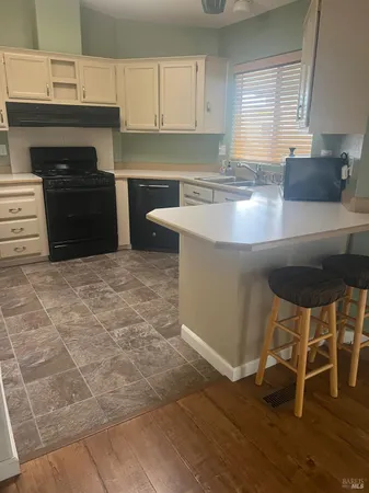 a view of empty room with floor to ceiling window