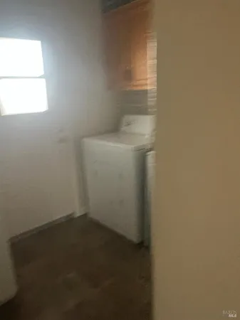 a view of house with backyard outdoor seating and hardwood