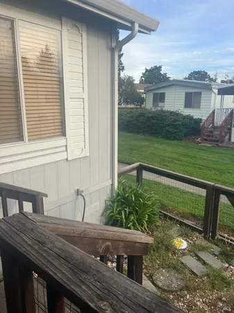 a view of a balcony with an ocean view