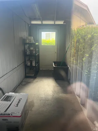 a view of storage and utility room