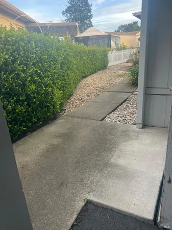 a view of a yard with an outdoor space
