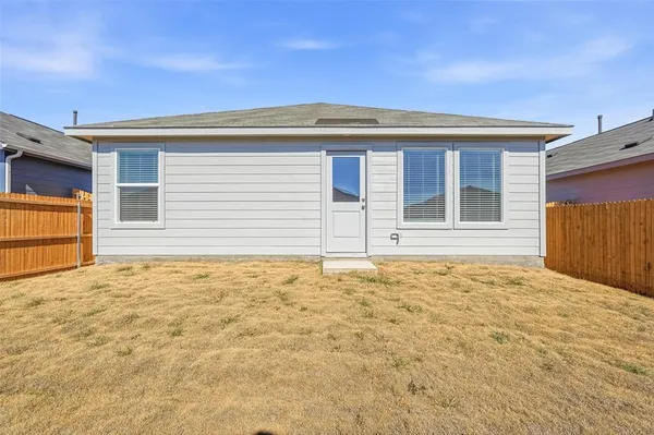 a view of a backyard of house