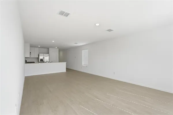 a view of kitchen and kitchen with sink