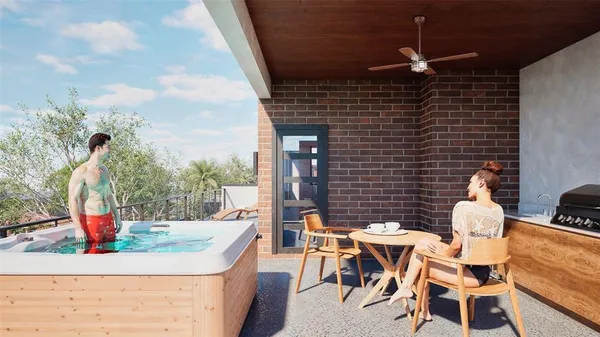 a view of living room kitchen with furniture and wooden floor