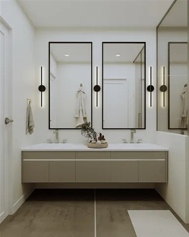 a bathroom with a tub a toilet and a sink