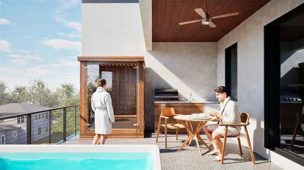 a view of swimming pool with seating area