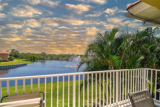a view of a two chairs on the roof deck