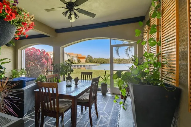 a view of a dining room with furniture window and outside view