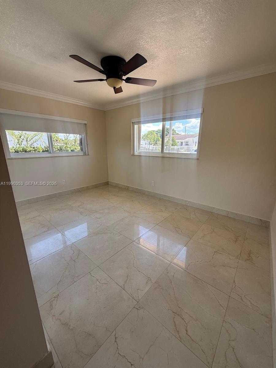 281 West 17th Street, Unit 281 Hialeah, FL 33010 - Photo 7 of 25 a view of an empty room with a window