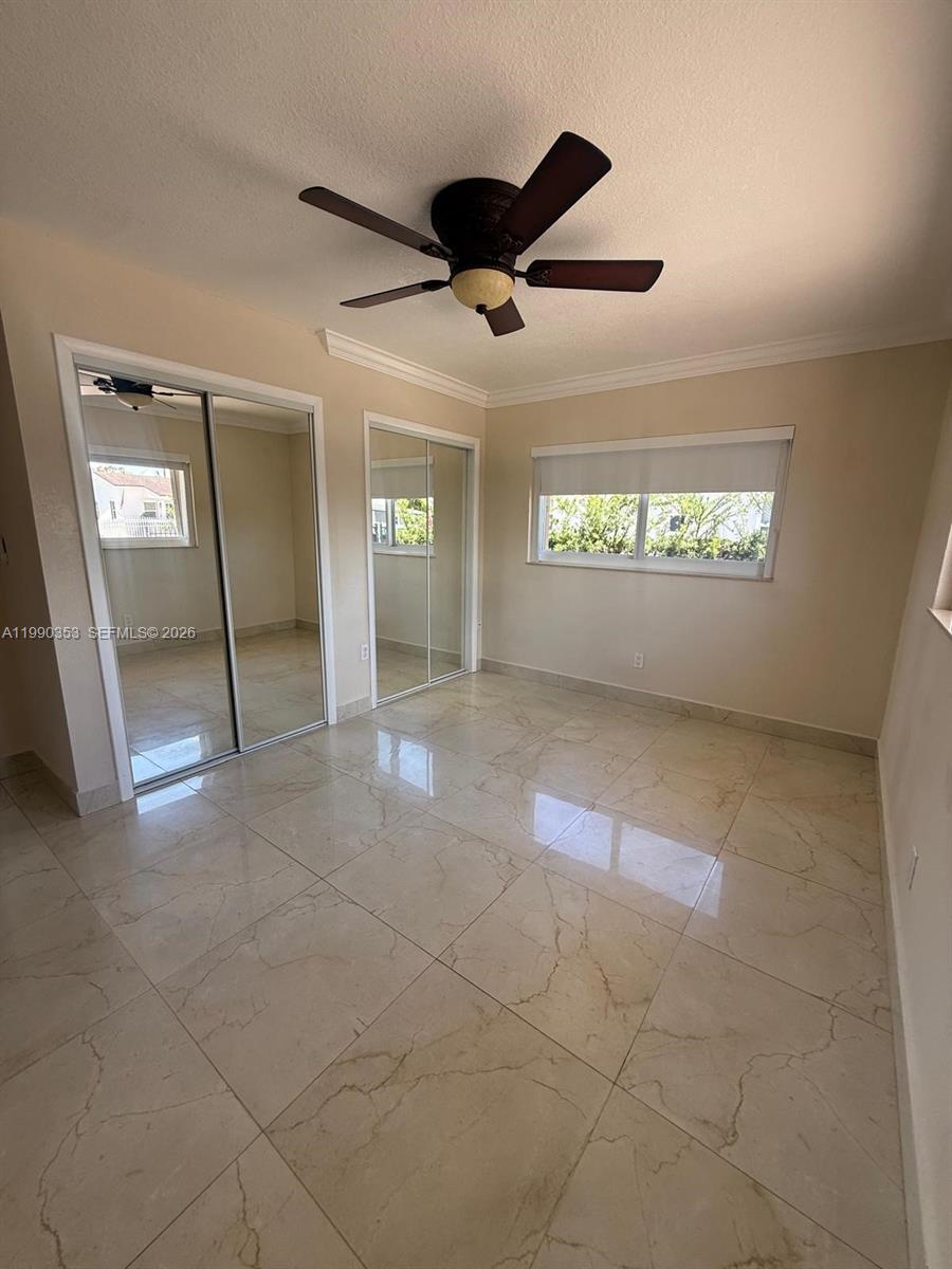 281 West 17th Street, Unit 281 Hialeah, FL 33010 - Photo 9 of 25 a view of an empty room with a window