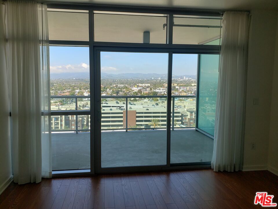 13700 Marina Pointe Drive, Unit 1219 Marina del Rey, CA 90292 - Photo 12 of 48 a view of front door and wooden floor