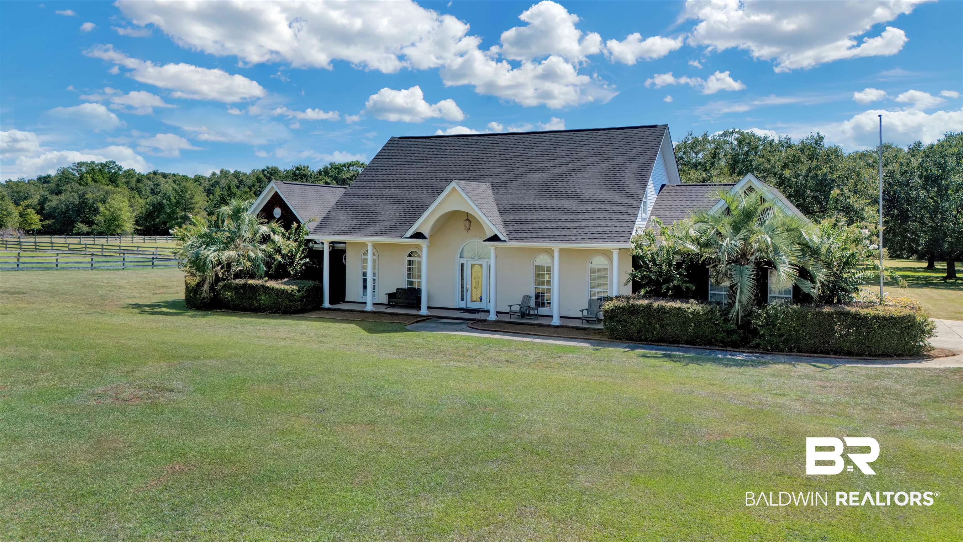27688 Rigsby Road Daphne, AL 36526 - Photo 3 of 56 View of front of house featuring a front lawn and covered porch