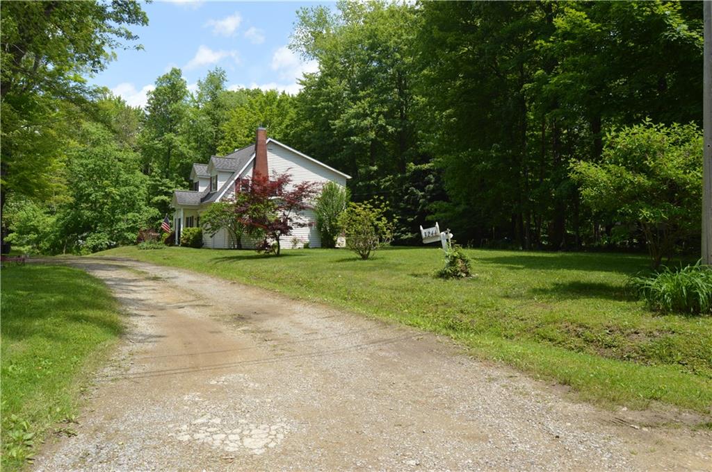 3244 Maple Lane Jamestown, PA 16134 - Photo 26 of 27 a front view of a house with yard and green space