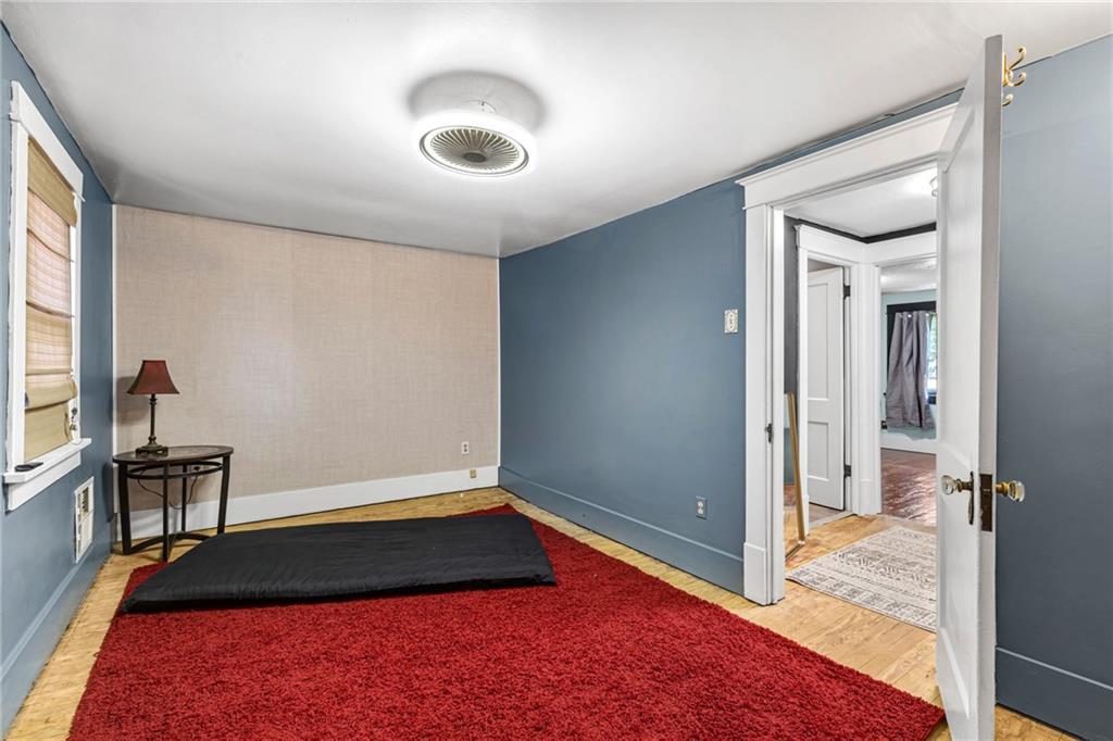 1201 5th Avenue Freedom, PA 15042 - Photo 16 of 32 a room with a bed and a window