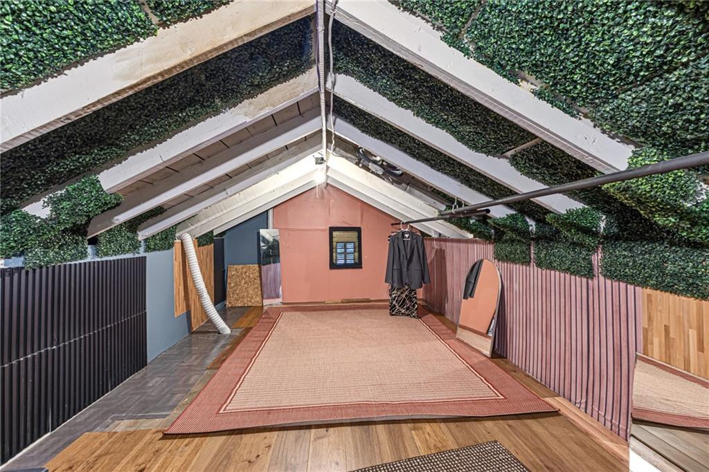 1201 5th Avenue Freedom, PA 15042 - Photo 18 of 32 a view of backyard with small cabin and wooden fencing