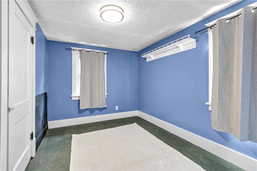 1201 5th Avenue Freedom, PA 15042 - Photo 20 of 32 a bathroom with a tub and a window