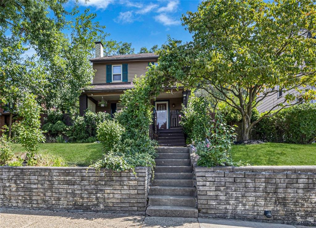 1201 5th Avenue Freedom, PA 15042 - Photo 2 of 32 a front view of a house with a yard