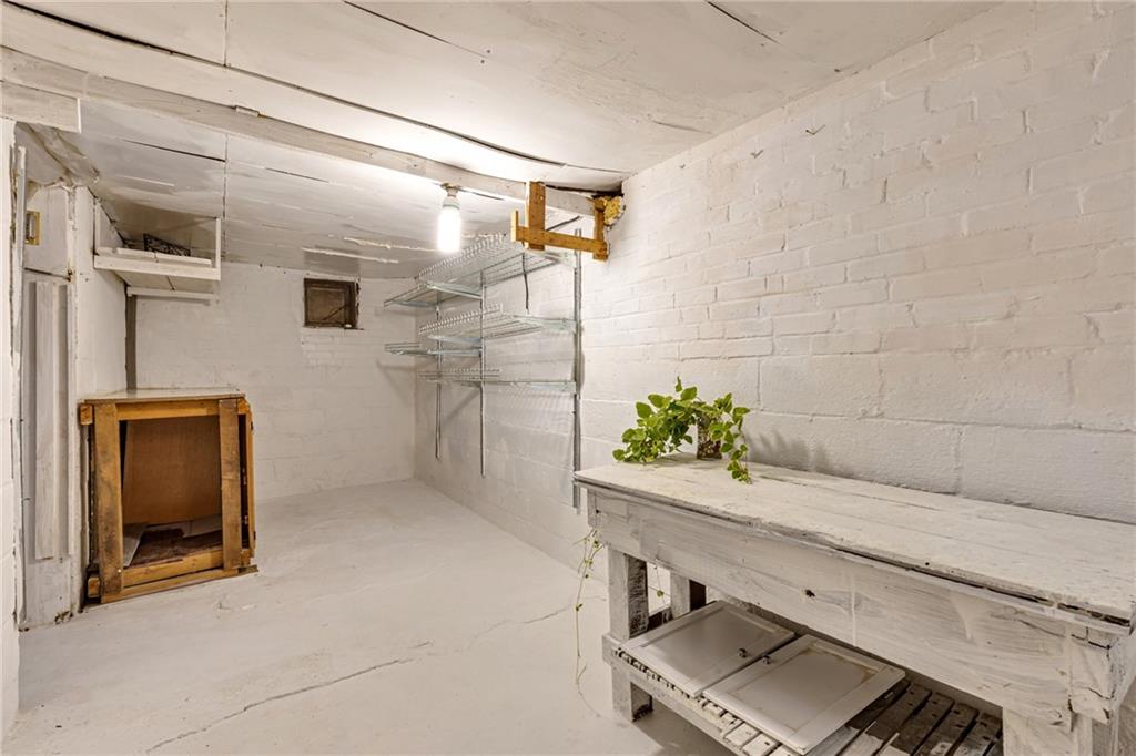 1201 5th Avenue Freedom, PA 15042 - Photo 23 of 32 a bathroom with a shower and a sink