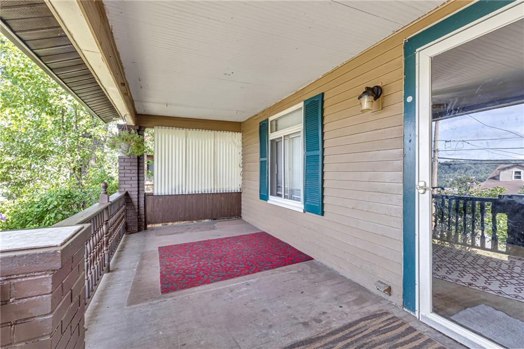 1201 5th Avenue Freedom, PA 15042 - Photo 4 of 32 a bedroom with a bed and window