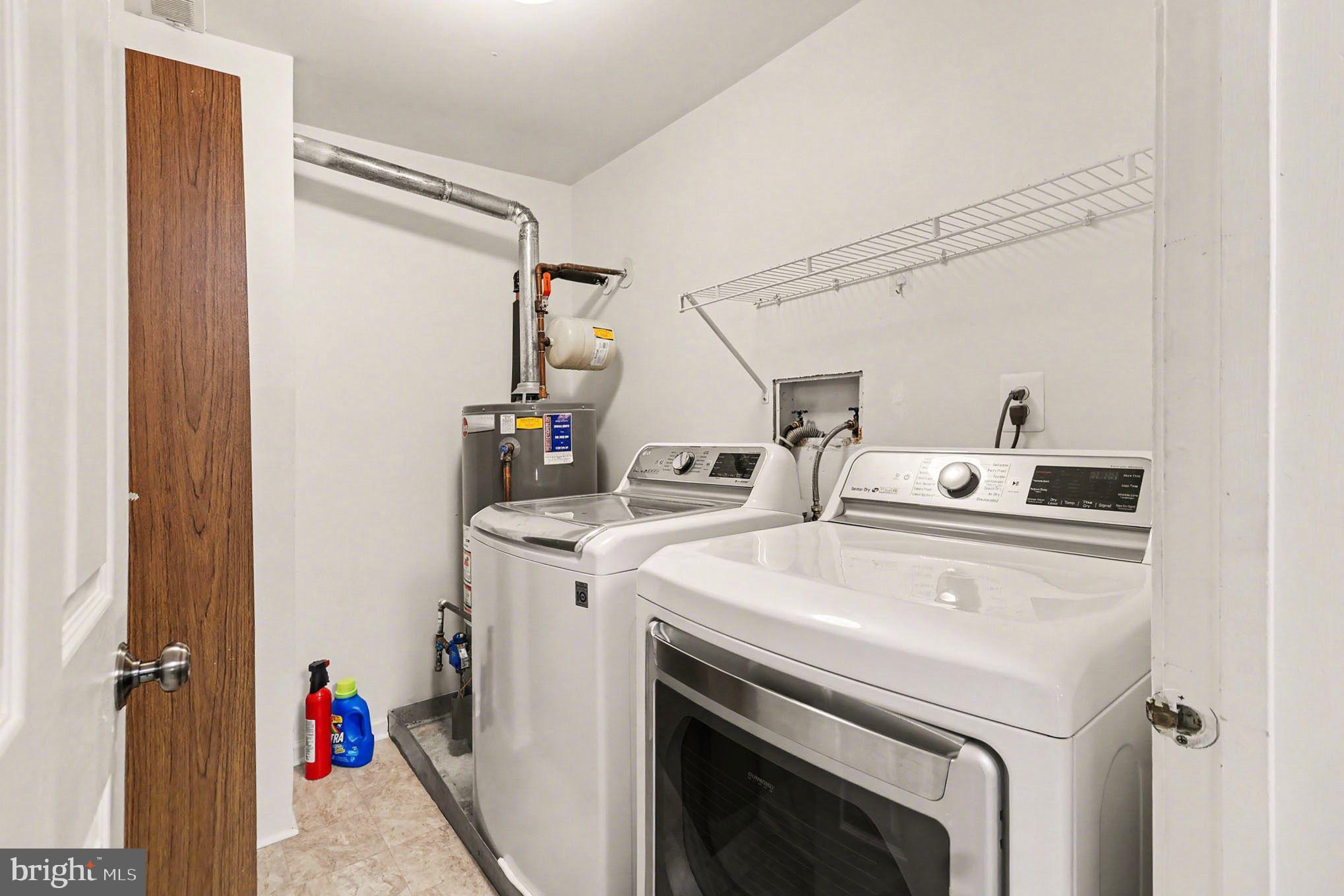 910 Mountainview Drive, Unit 910 Chesterbrook, PA 19087 - Photo 20 of 27 a utility room with dryer and washer