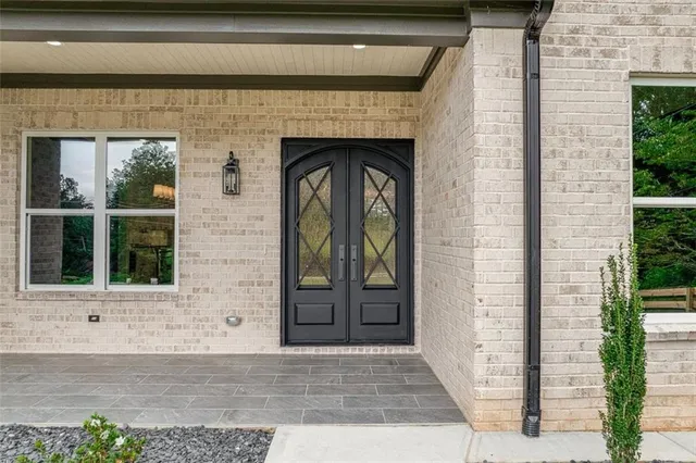 a kitchen with a sink cabinets and window